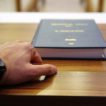 Nanda & Associate Lawyers Canada - A lawyer with a legal document in front of them