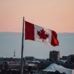 Nanda & Associate Lawyers Canada - The Canadian flag in the wind