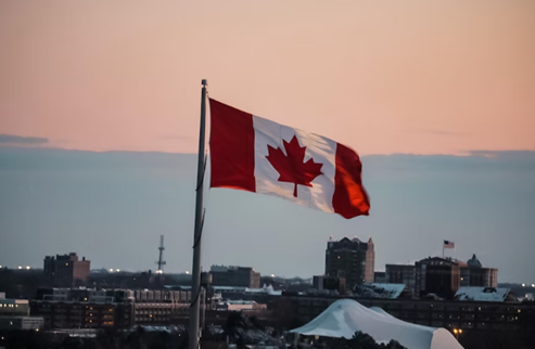 Nanda & Associate Lawyers Canada - The Canadian flag in the wind