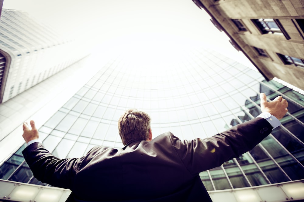 Nanda & Associate Lawyers Canada - Low-angle photography of a man looking up