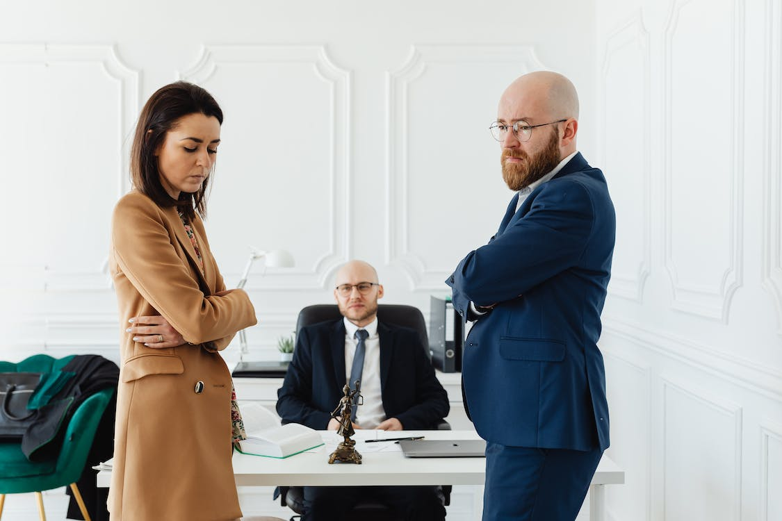 Nanda & Associate Lawyers Canada - An upset couple with their divorce lawyer
