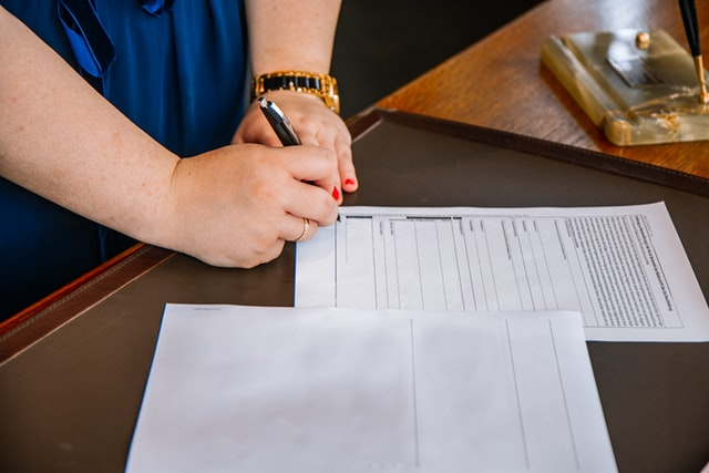 An estate litigation lawyer handling the legal paperwork