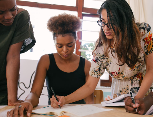 Women collaborating in a workplace. 