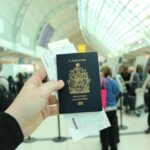 Nanda & Associate Lawyers Canada - Person holding a Canadian passport