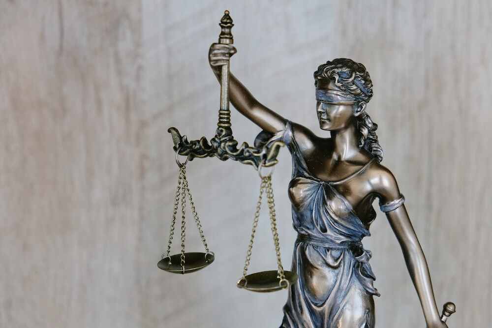 Nanda & Associate Lawyers Canada - A statue of a woman representing justice