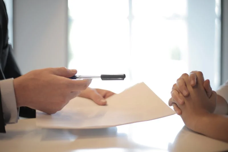 a couple finalizing their premarital agreement