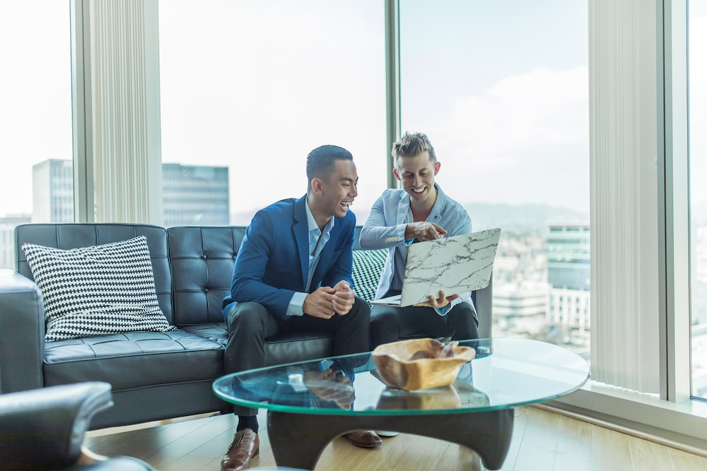 Nanda & Associate Lawyers Canada - Business owners discussing asset protection strategies