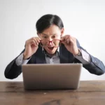 Nanda & Associate Lawyers Canada - A man reading about immigration law myths