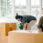 Nanda & Associate Lawyers Canada - An image of a couple unpacking boxes at home
