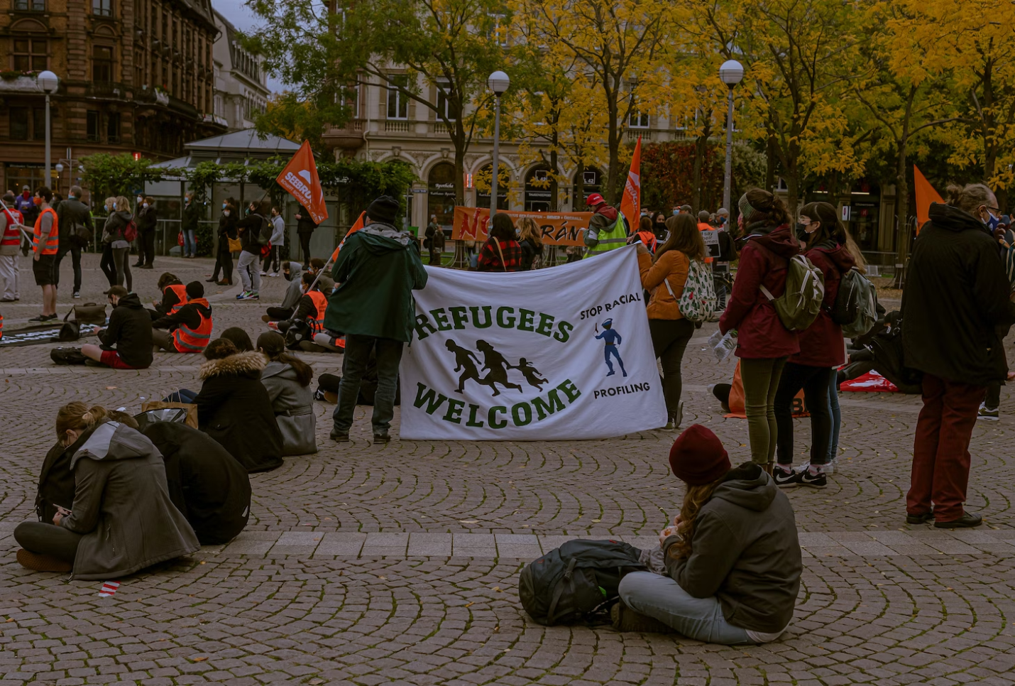 An image of people gathered on the street