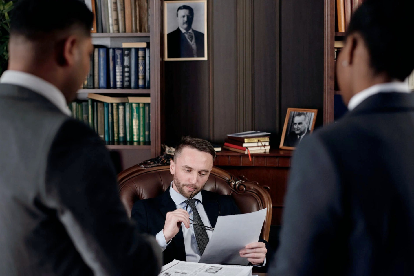 Nanda & Associate Lawyers Canada - An image of a real estate lawyer reading a contract