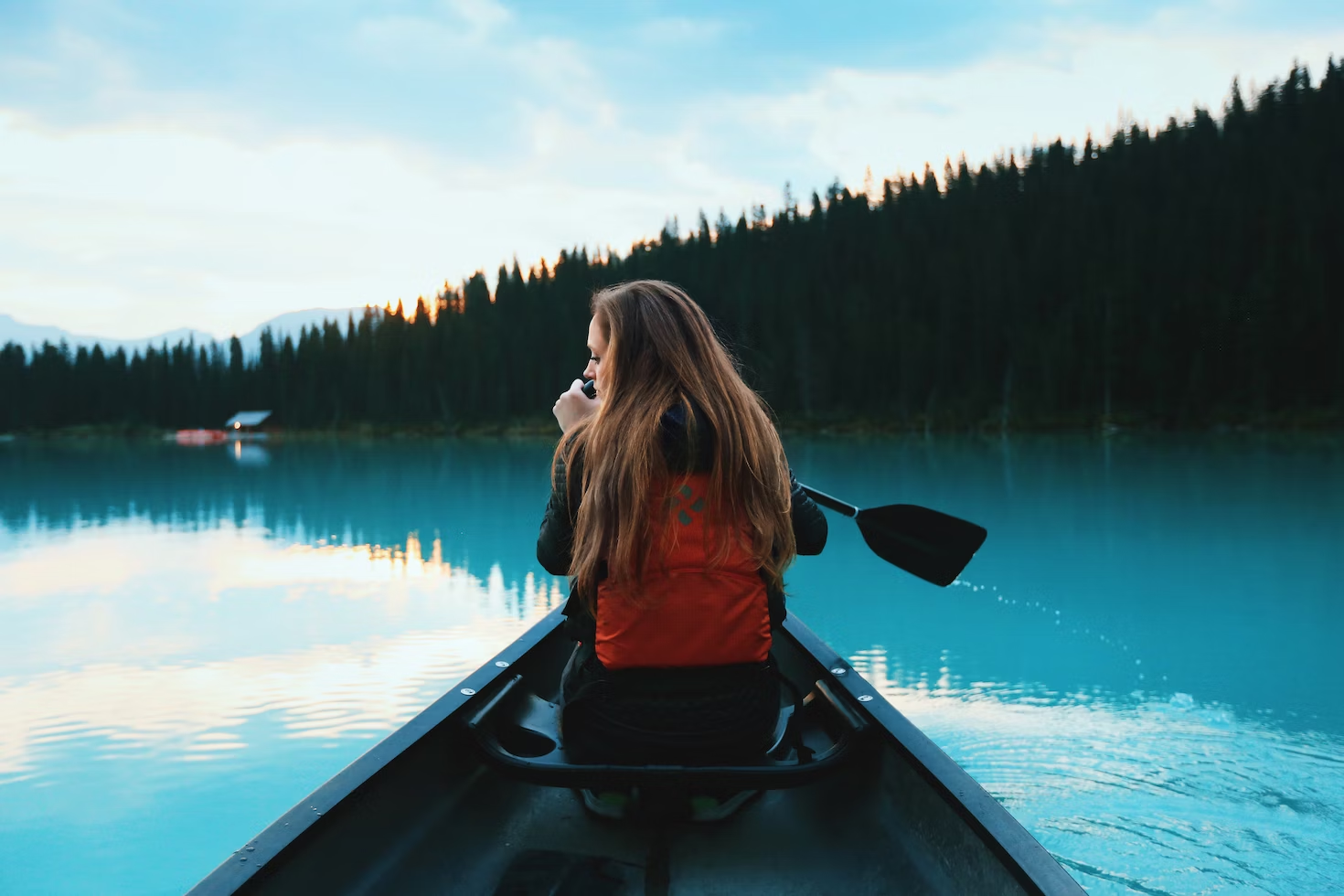 An image of a woman in a boat
