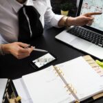 Nanda & Associate Lawyers Canada - An estate lawyer completing paperwork