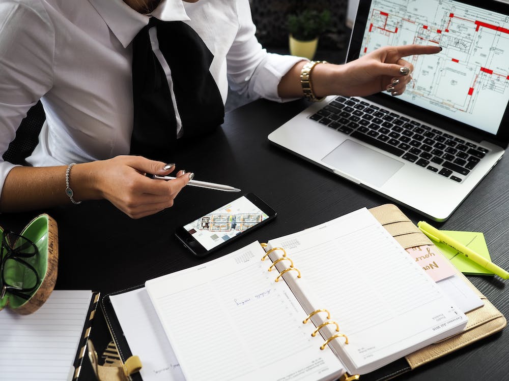 Nanda & Associate Lawyers Canada - An estate lawyer completing paperwork