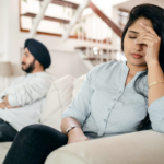 Nanda & Associate Lawyers Canada - An image of a man and woman sitting on the couch looking after a conflict