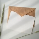 Nanda & Associate Lawyers Canada - A brown and a white envelope