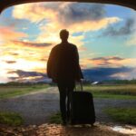 Nanda & Associate Lawyers Canada - A person walking out with luggage