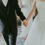 Nanda & Associate Lawyers Canada - An image of a couple holding hands at their wedding
