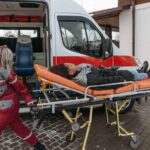 Nanda & Associate Lawyers Canada - A person receiving urgent medical care after a car accident