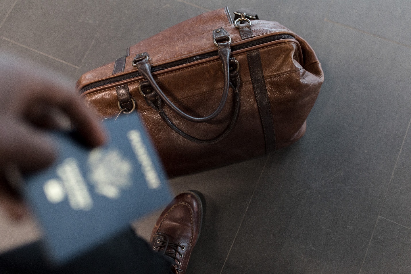 Nanda & Associate Lawyers Canada - a refugee with a duffel bag in Canada