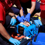 Nanda & Associate Lawyers Canada - medical personnel helping an injured person