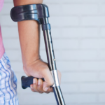 Nanda & Associate Lawyers Canada - a person holding a walking aid