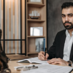 Nanda & Associate Lawyers Canada - A business lawyer working in his office