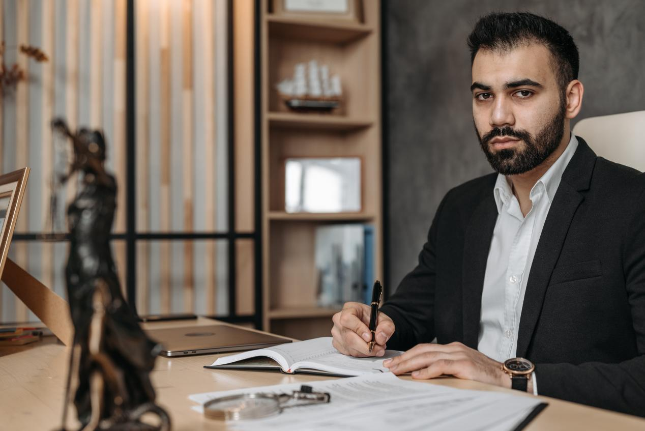 Nanda & Associate Lawyers Canada - A business lawyer working in his office