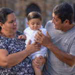 Nanda & Associate Lawyers Canada - A young boy is reunited with his grandparents through the Canadian sponsorship program