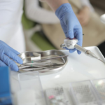 Nanda & Associate Lawyers Canada - A doctor holding medical instruments