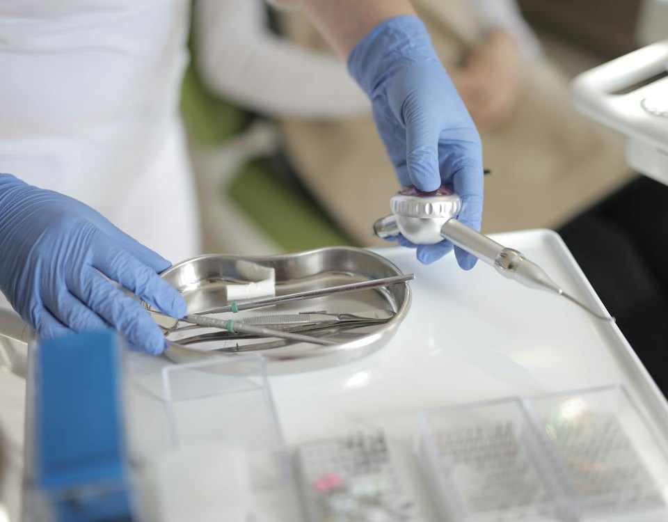 Nanda & Associate Lawyers Canada - A doctor holding medical instruments