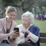 Nanda & Associate Lawyers Canada - A mother and daughter looking at a phone