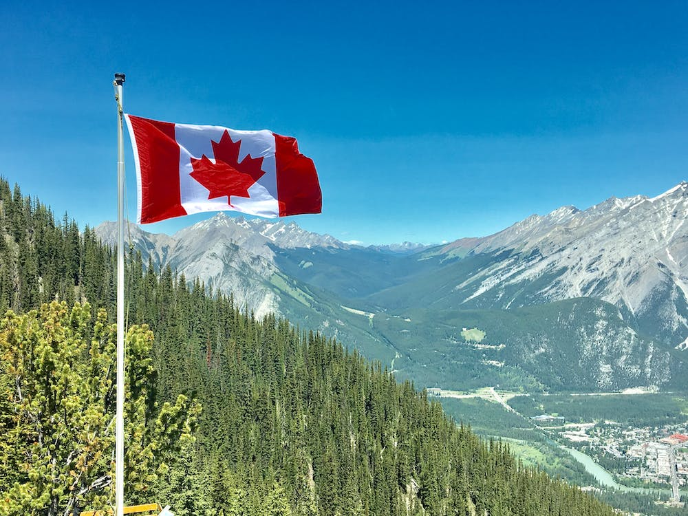 Nanda & Associate Lawyers Canada - Canadian Flag Fluttering Prominently
