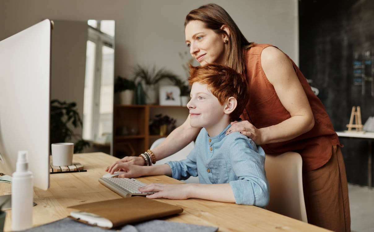 Nanda & Associate Lawyers Canada - A mother with her child