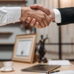 Nanda & Associate Lawyers Canada - A lawyer and client shaking hands
