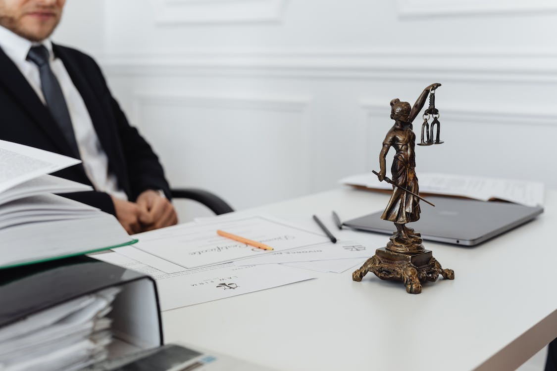 Nanda & Associate Lawyers Canada - A lawyer on his desk